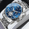 Montre chronographe OLEVS Grenoble bleue présentée sur un coussin