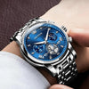 Montre chronographe homme OLEVS Grenoble bleue portée au poignet