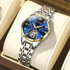 Montre femme OLEVS Charlotte bleue posée sur un coussin
