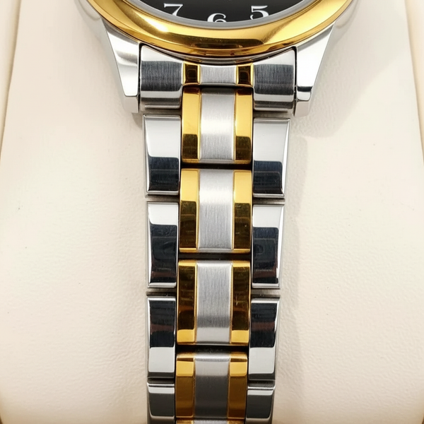Détail du bracelet acier argenté et doré de la montre OLEVS Colette noire
