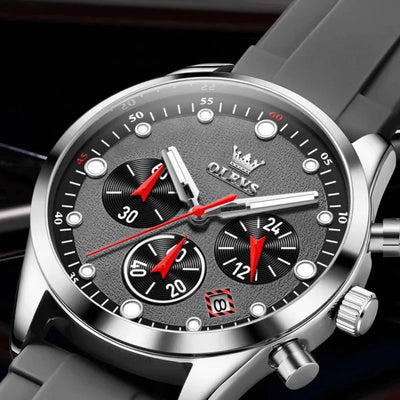 Vue rapprochée boutons latéraux montre sport Marseille grise