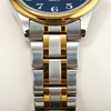 Détail du bracelet en acier bicolore argenté et doré de la montre Olevs Colette
